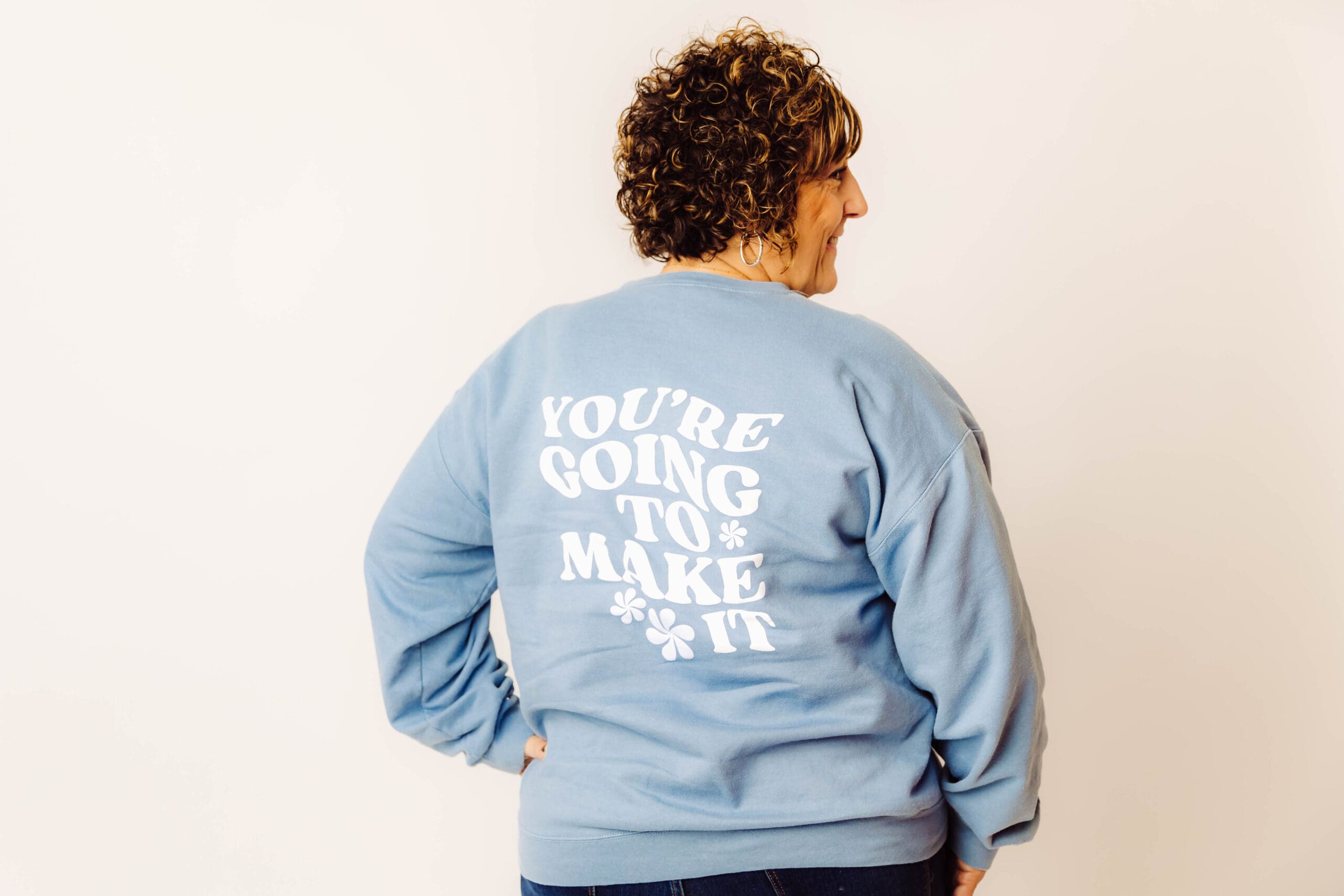 Grieving Mom wearing a shirt that says "You're going to make it!"
