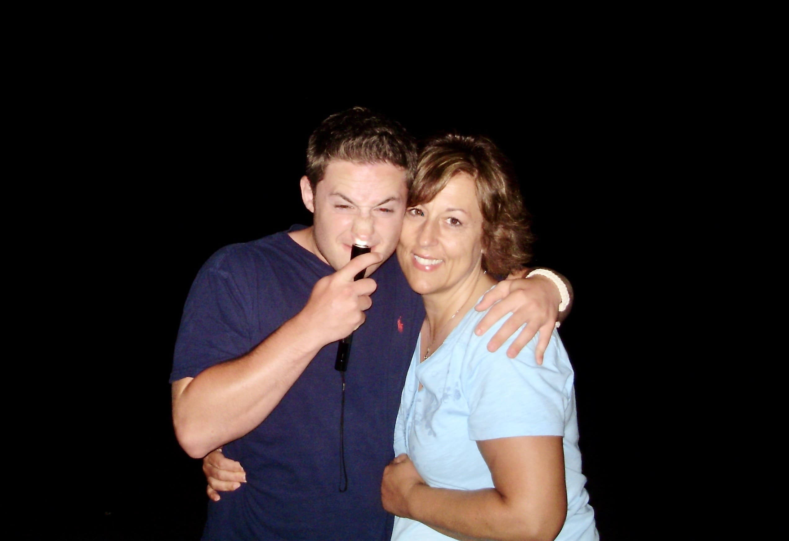 Teresa Davis smiling with her son Andrew before his passing.
